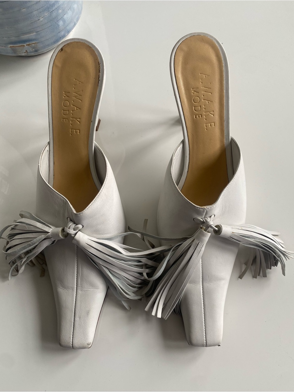 Awake Mode White Leather Tassel Mules